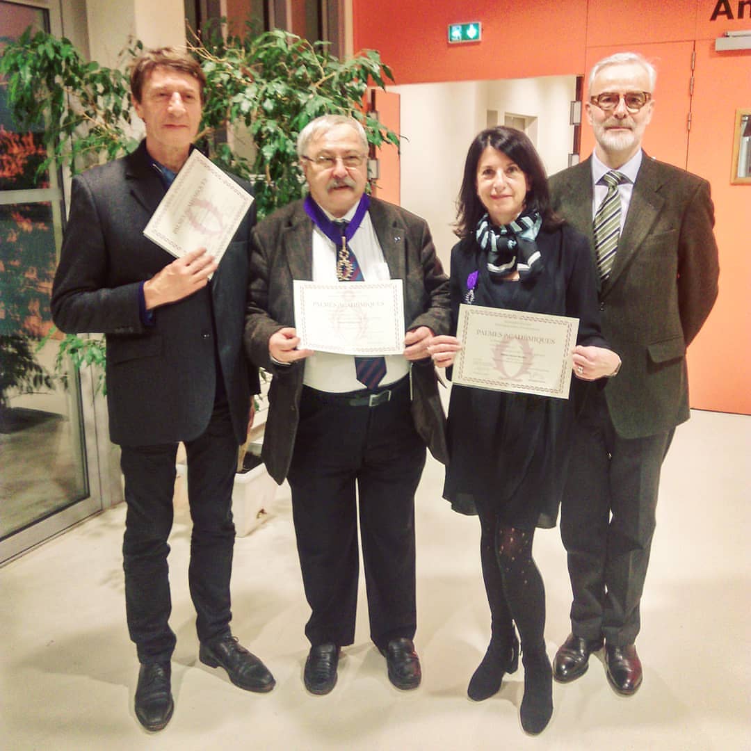 Remise des Palmes académiques par le directeur de l'Enssib